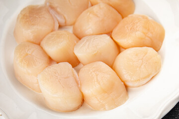 sea scallop raw seafood fresh tasty food dish delicious gourmet food background on the table rustic food top view copy space pescetarian diet