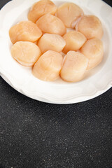 sea scallop raw seafood fresh tasty food dish delicious gourmet food background on the table rustic food top view copy space pescetarian diet