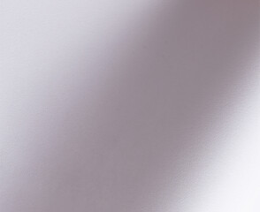 White, off-white, and ivory paper with smooth, soft texture. Grainy finish and subtle gradient create an elegant, minimal design with sleek curves. Chic, neutral backdrop with a matte, refined surface