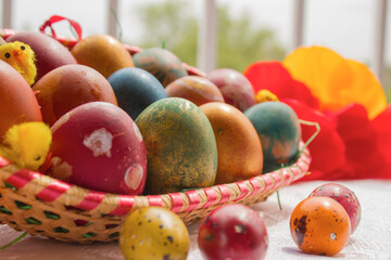 Happy Easter, Easter eggs hand painted in different colors.