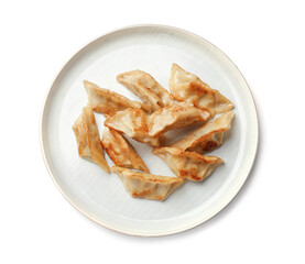 Tasty fried gyoza dumplings isolated on white, top view