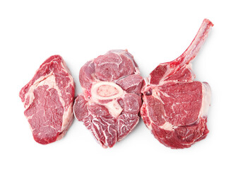 Pieces of raw beef meat isolated on white, top view