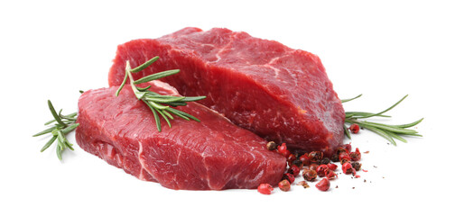 Pieces of raw beef meat and spices isolated on white