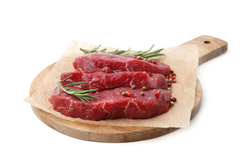 Pieces of raw beef meat, rosemary and peppercorns isolated on white