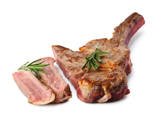 Pieces of delicious beef meat and rosemary isolated on white