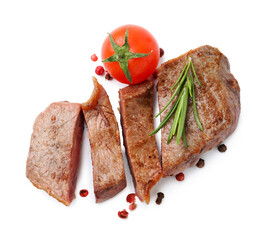 Pieces of delicious beef meat, spices and tomato isolated on white, top view