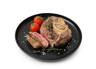 Pieces of delicious beef meat, thyme, salt and tomatoes isolated on white