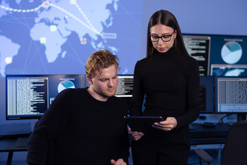 Hard working professional cyber security team discuss how to prevent security threats, find vulnerability and solve incidents