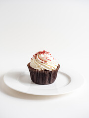 delicious sweet cupcake on white background, front view