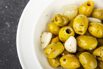 olives mediterranean snack garlic aperitif fresh tasty food dish gourmet food background on the table rustic food top view copy space vegetarian and vegan food