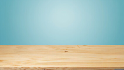 Empty wooden table on blue background