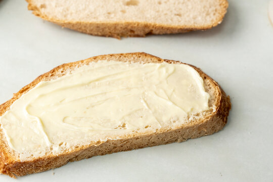 Sliced sourdough bread with butter