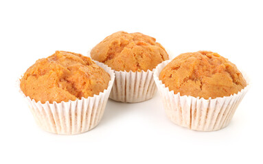 Tasty sweet carrot muffins isolated on white