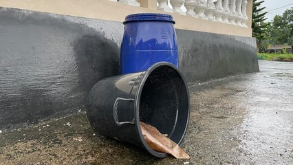 Plastic Barrels and Buckets Outdoors