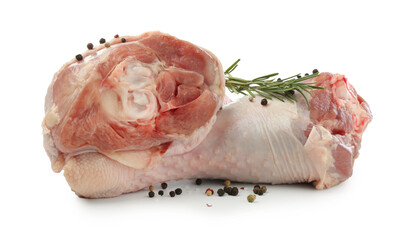Raw turkey drumsticks and spices isolated on white