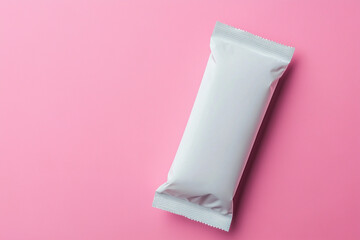 Fototapeta premium Bar snack white packaging mockup viewed from the top, isolated on a color background