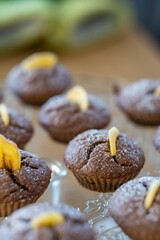 Vertical shot of a delicious, chocolate cupcake with fruits