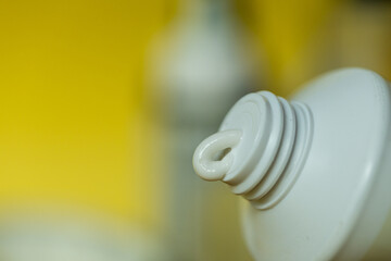 close-up of a tube of cream. squeezing cream out of a tube. cosmetics and skin care