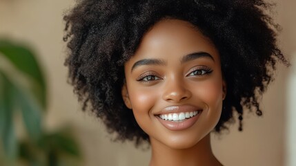 African female adult smiling outdoors with natural hair and bright expression