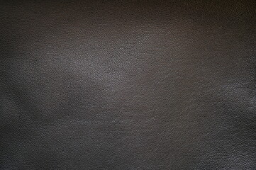 black leather texture close-up, seams on leather jacket as background, black natural leather as background, black leather stitching