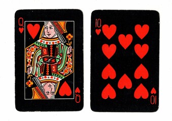A pair of vintage blackjack or pontoon playing cards on a white background. © Philip