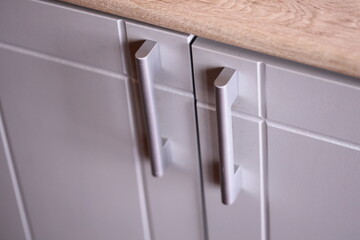 A close-up view of a kitchen counter with a wooden top, perfect for use in cooking and food-related images.