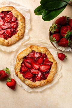 Strawberry Galette with almonds.  Homemade sweet pie with beeries. Vertical image.