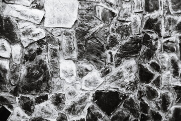 Fototapeta premium A close-up image of a stone wall in monochrome.