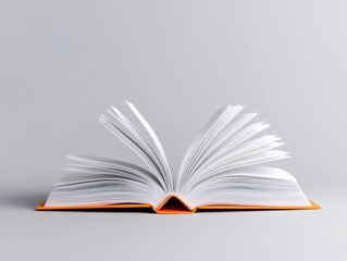 Fototapeta premium Open book with orange cover.