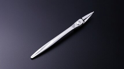Precision tweezers on black background, for medical or technical use