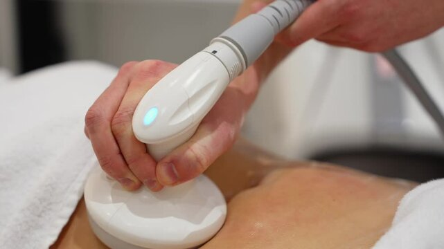 Body contouring treatment at a wellness center for improved appearance and relaxation experience