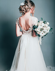 Naklejka premium bride with a bouquet of flowers