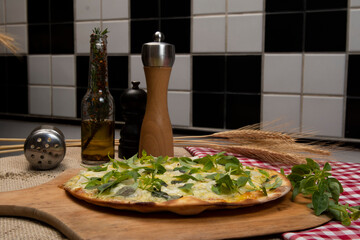 Brazilian pizza with cheese, mozzarella and basil