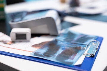 Well organized empty medical cabinet ready for healthcare services, featuring medical test results and radiography scans. Tools and equipment for accurate diagnostics and patient care. Close up.