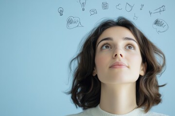 woman looking up with idea doodles