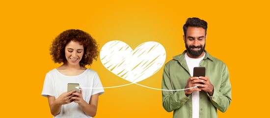 A couple enjoys Valentines Day by connecting through their smartphones, exchanging loving texts and heartfelt messages. Their smiles reflect the joy of celebrating their bond together.