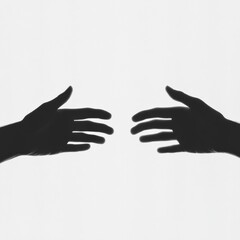 Obraz premium Silhouetted Hands Reaching Out on White Background