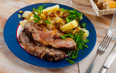 Appetizing grilled pork loin chops with boiled potato
