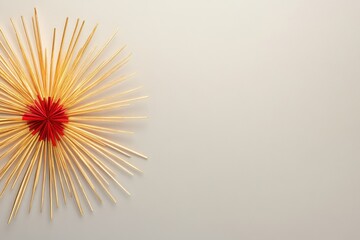 Obraz premium Starburst Decoration with Straws on a Plain Background