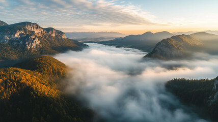 Obraz premium 雲海に包まれる山岳地帯 – 空から眺める幻想の絶景