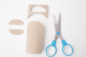 step in creative process, making pinguin body from recycled empty toilet paper roll, fun for kids...