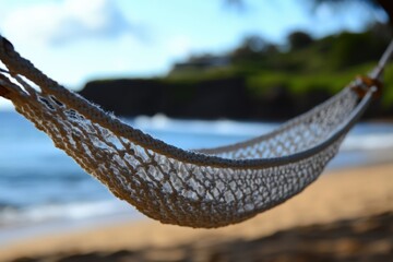 Obraz premium Serene Beachside Scene: A Relaxing Hammock Strung Between Palm Trees with a Background of Gentle Waves and Lush Greenery, Ideal for Leisure and Reflection