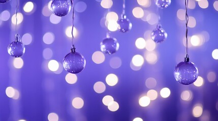 Fototapeta premium purple christmas ornaments hanging with bokeh lights