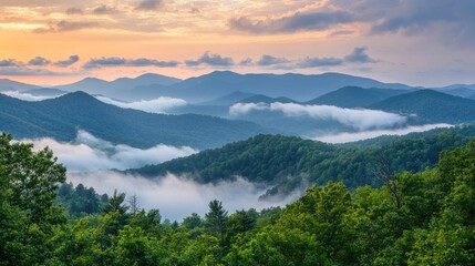Obraz premium Misty mountain range at sunset.
