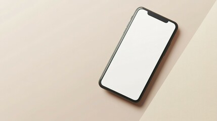 Modern smartphone with blank screen rests on a colored surface