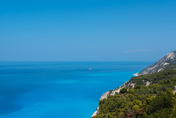 Ionian sea from a cliff overlooking Egremni beack in Lefkada, view as far as the eye can see where the sky merges into the sea