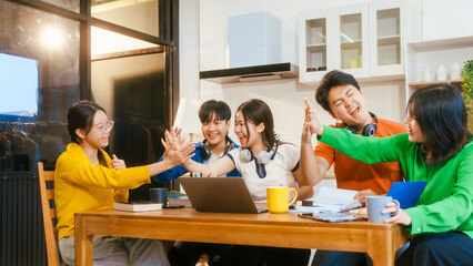 Five young Asian students engage in online study on campus, collaborating on research, projects. They help each other with assignments, gaining valuable experience and preparing for future careers.