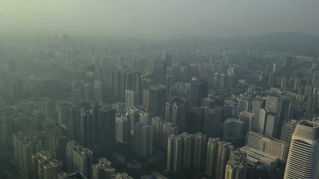 Bird's-eye view of city center in foggy morning, Guangzhou, China.