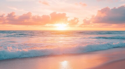 Obraz premium Caribbean sunset with orange and pink hues, calm waves, and a clean horizon, evoking serenity and natural beauty. 