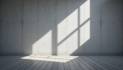Obraz premium Sunlight casts shadows across a blank wall and wooden floor